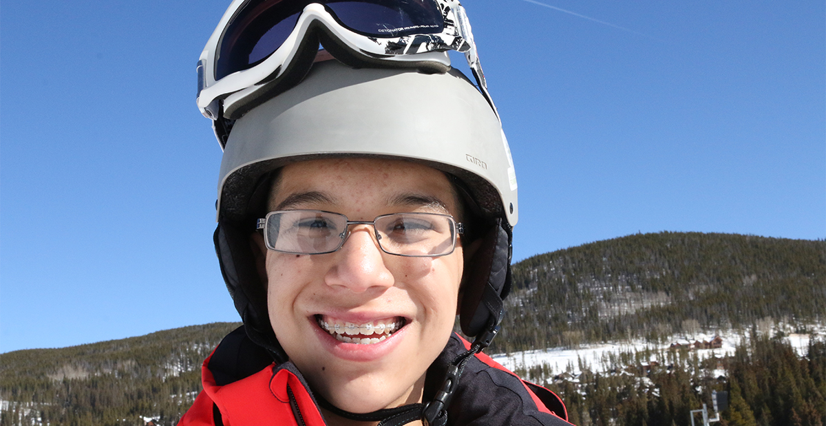 alfonso with helmet and goggles on while on 2017 ski trip
