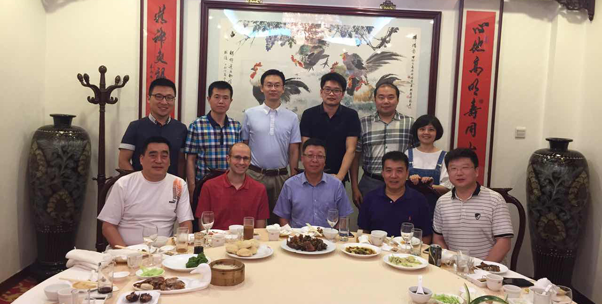 Scottish Rite Hospital doctor and researcher at dinner in China. 