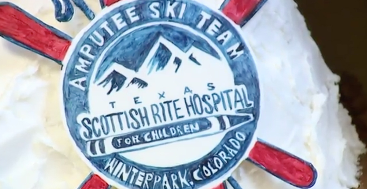 ski trip logo on cake