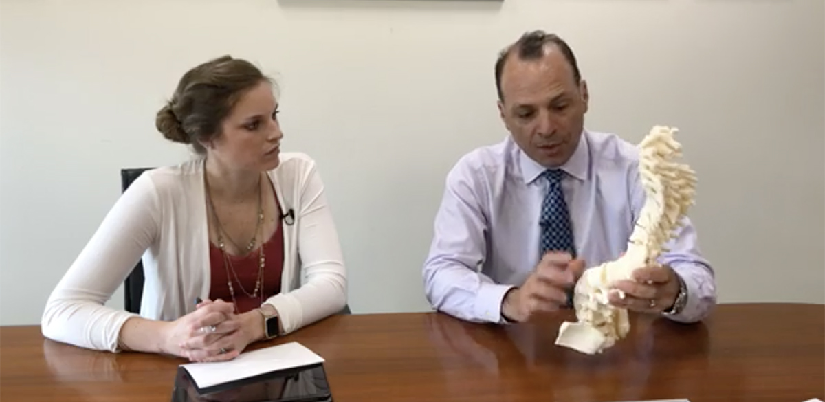 Dr. Sucato explains a 3D spine on Facebook live. 